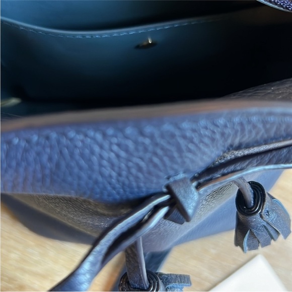 Kate Spade mini bucket bag. Never used. Missing tags but has care card. - Picture 9 of 11